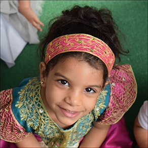 Students working at a market